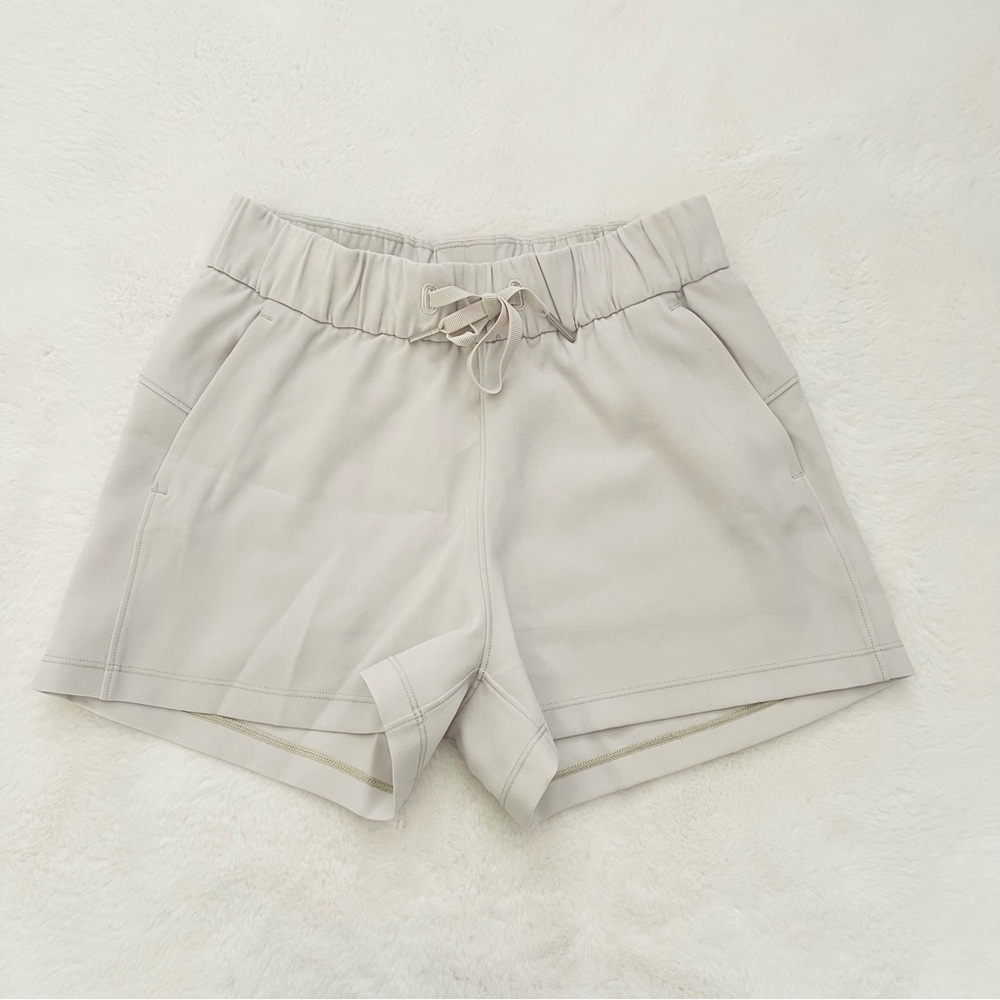 Lululemon On the Fly High Waist Cream Shorts
